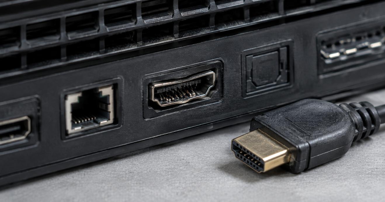 Close-up of a game console HDMI port with visibly bent internal pins, the most common cause of an Xbox showing no signal
